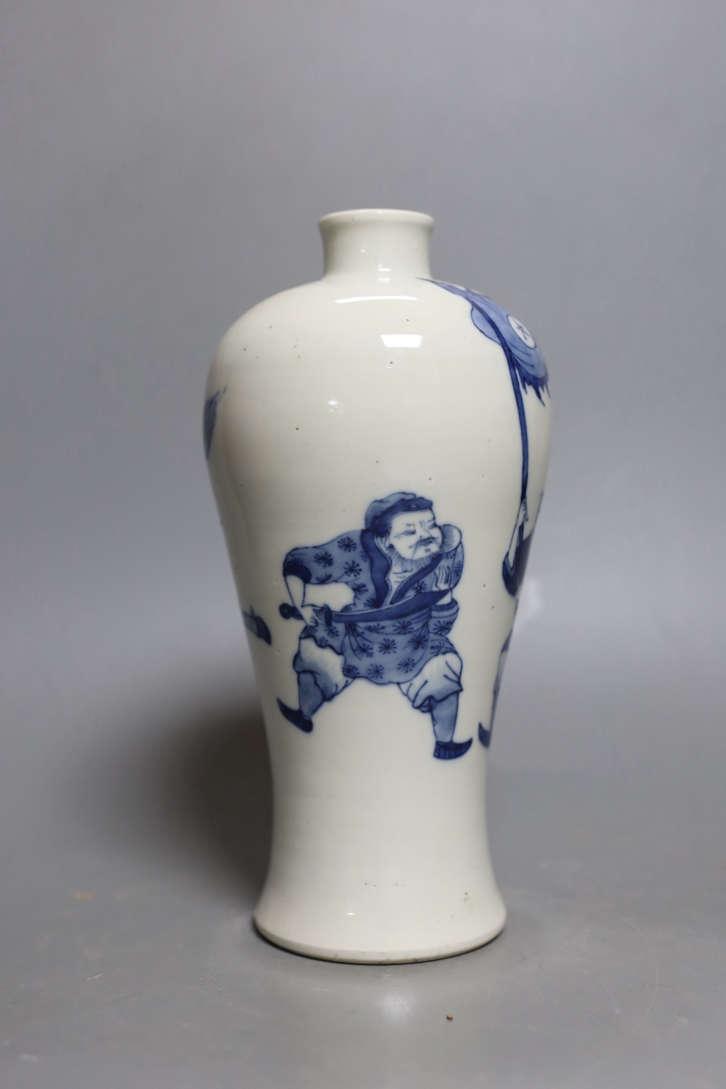 A Chinese blue and white baluster ‘warrior’ vase. 22cm tall